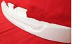 Replacement REPN011708 front bumper absorber, angled view showing mounting blocks