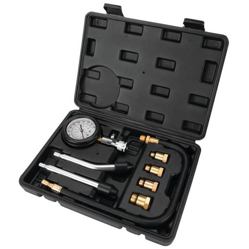 Performance Tool W80584 deluxe compression tester kit in an open fitted storage case with pressure gauge, hose and threaded adapters