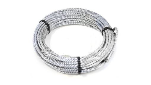 Coiled galvanized steel winch rope with twisted wire strands held by black cable ties on a white background